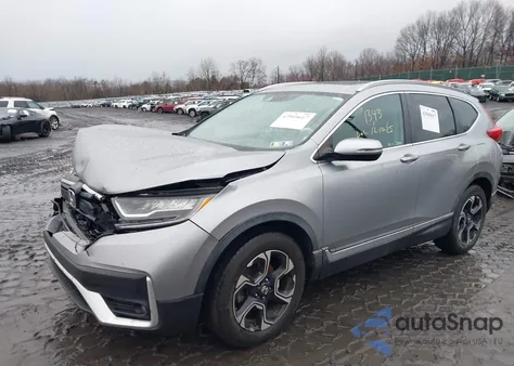 2019 Honda Cr-V Touring z USA, uszkodzony, nr VIN JHLRW2H92KX007825